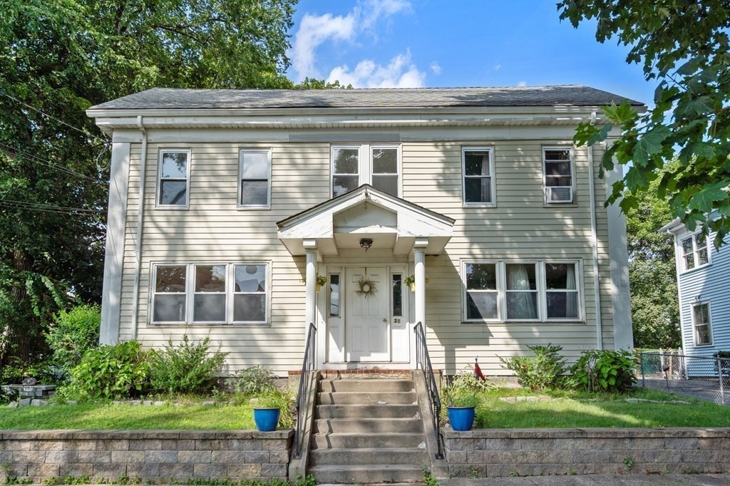 21 Fayette Street Watertown, MA 02472 - Photo 4 of 25 a front view of a house with garden