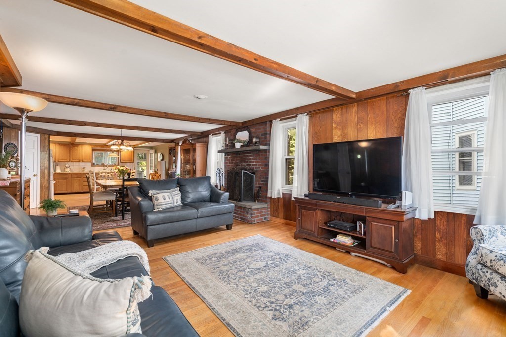 21 Fayette Street Watertown, MA 02472 - Photo 5 of 25 a living room with furniture and a flat screen tv