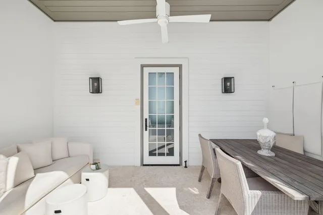 a bathroom with a mirror and vanity