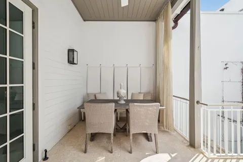 a bedroom with a bed and a flat tv screen