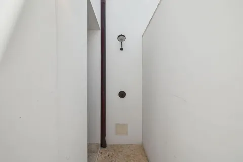 a bathroom with a sink a mirror and a bathtub