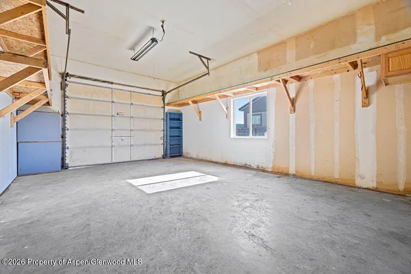 a view of empty room with garage