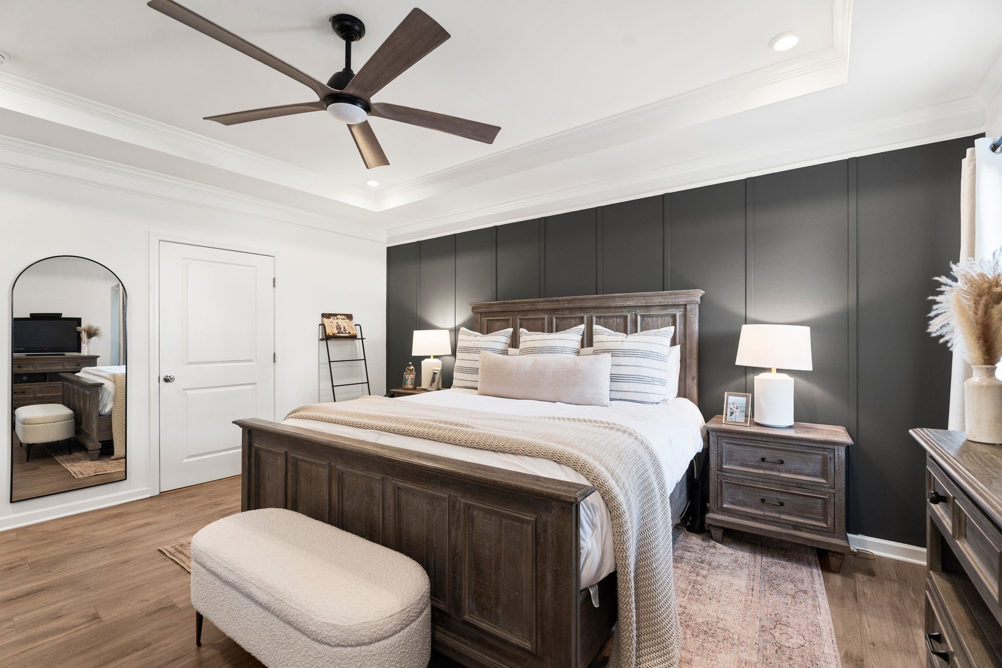 1306 Ardmore Ln Mount Mount Juliet, TN 37122 - Photo 20 of 41 a bedroom with a bed a couch and a chandelier