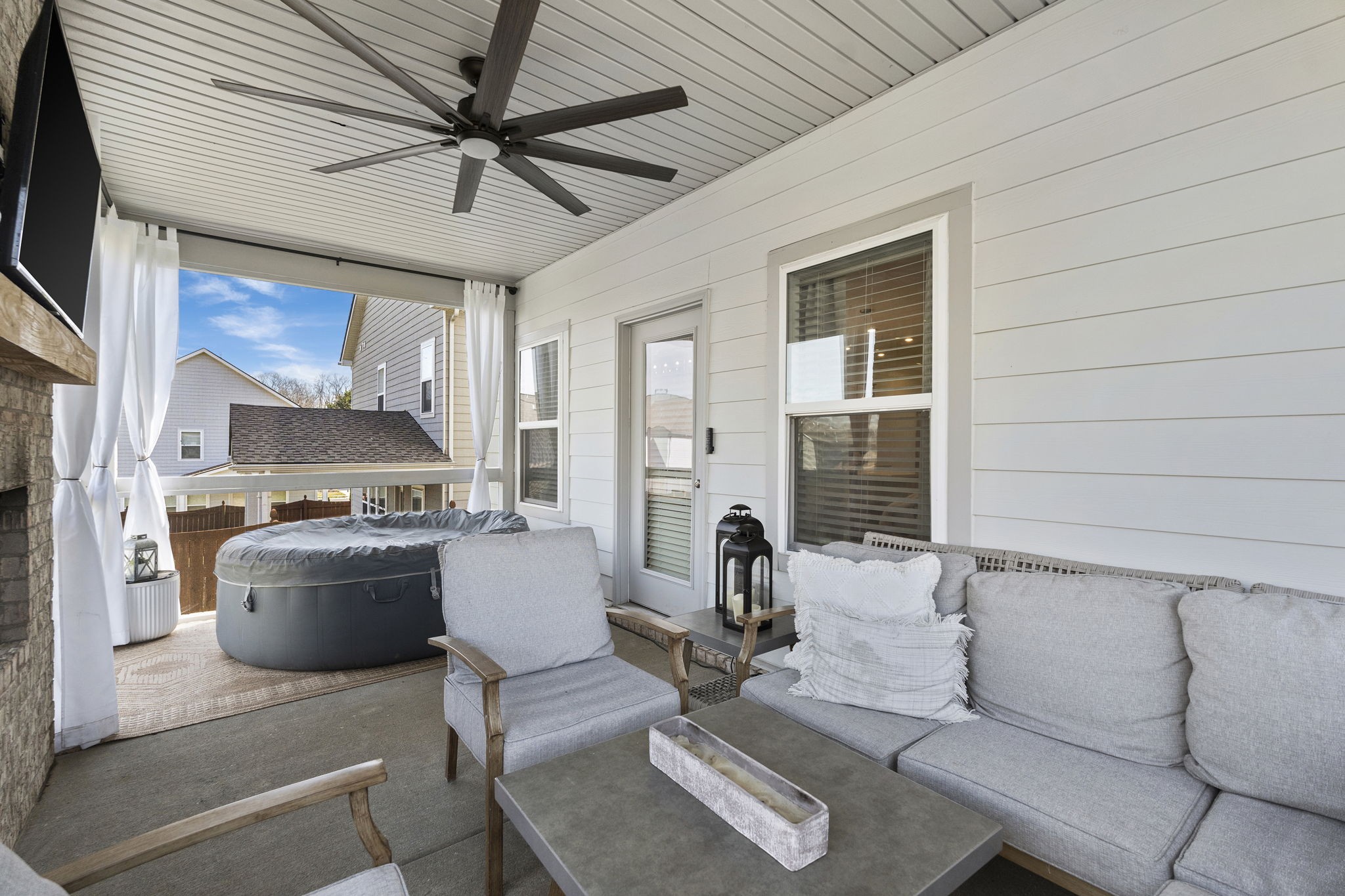 1306 Ardmore Ln Mount Mount Juliet, TN 37122 - Photo 35 of 41 a living room with furniture and a flat screen tv