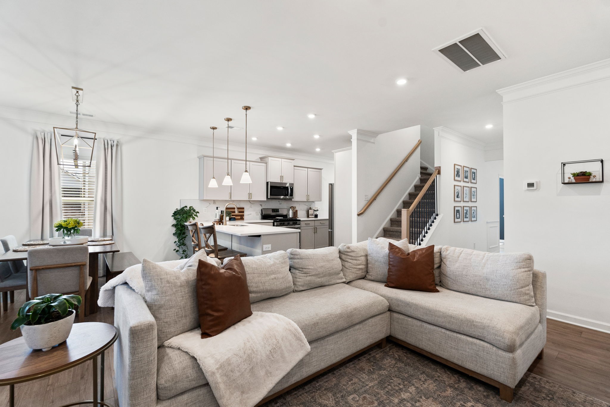 1306 Ardmore Ln Mount Mount Juliet, TN 37122 - Photo 7 of 41 a living room with furniture kitchen view and a chandelier