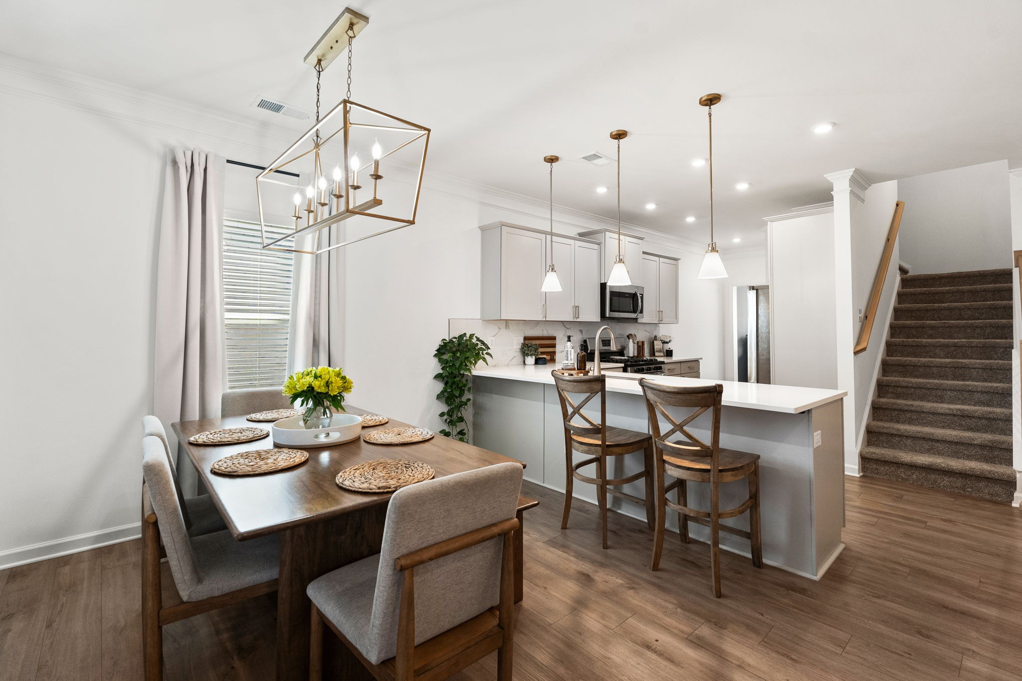 1306 Ardmore Ln Mount Mount Juliet, TN 37122 - Photo 10 of 41 a kitchen with a dining table chairs and wooden floor