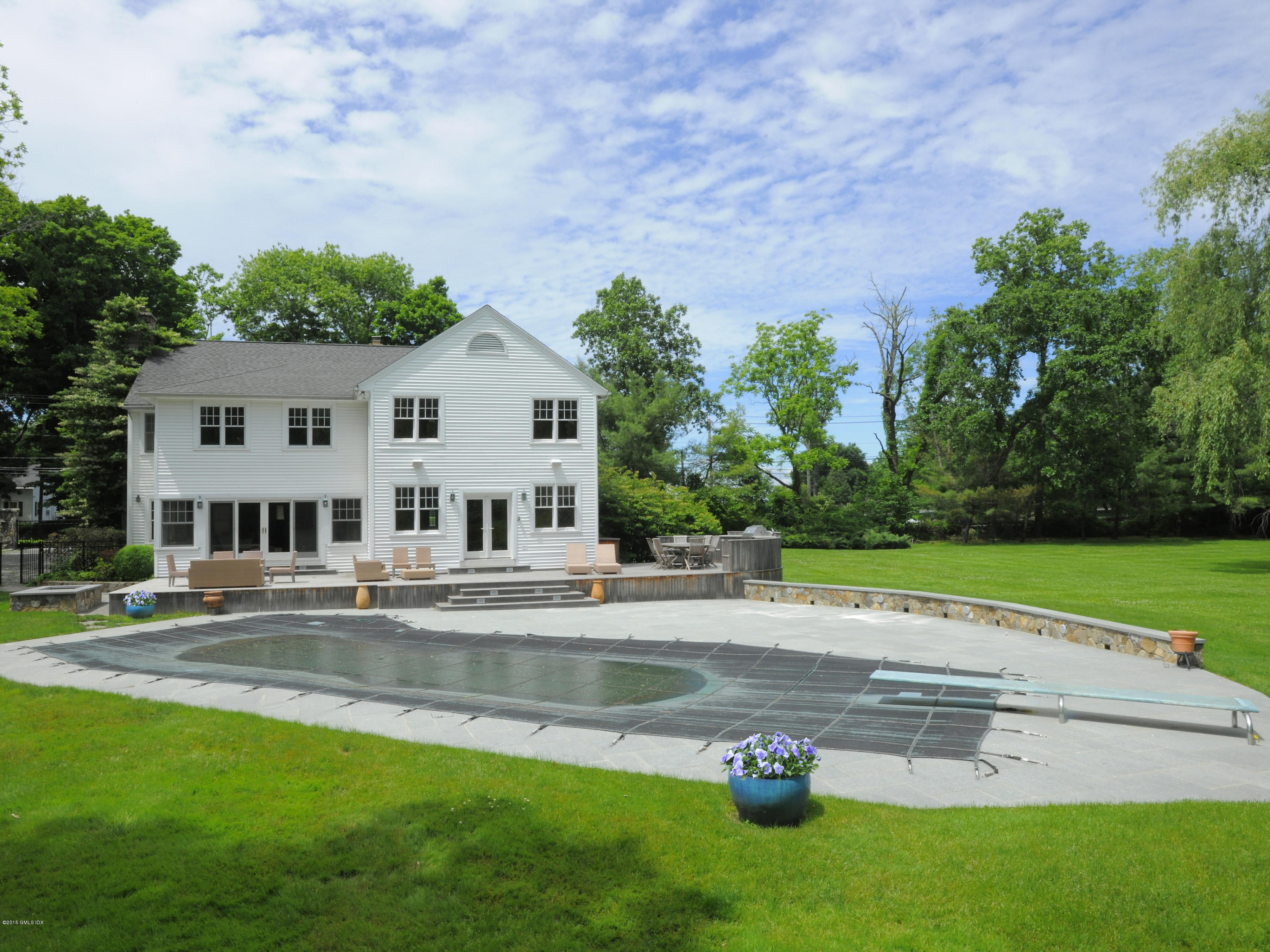 48 Locust Road Greenwich, CT 06831 - Photo 6 of 20 a view of pool with house in background
