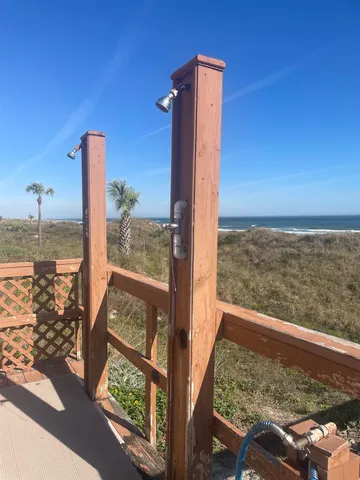 a view of beach and an ocean