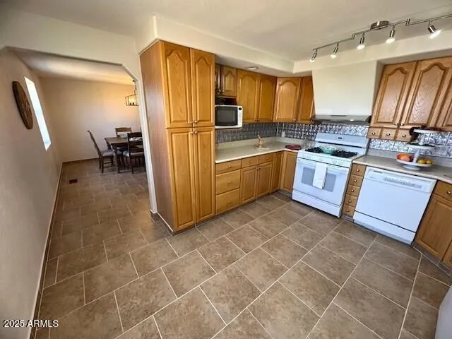 a view of a hallway with entryway
