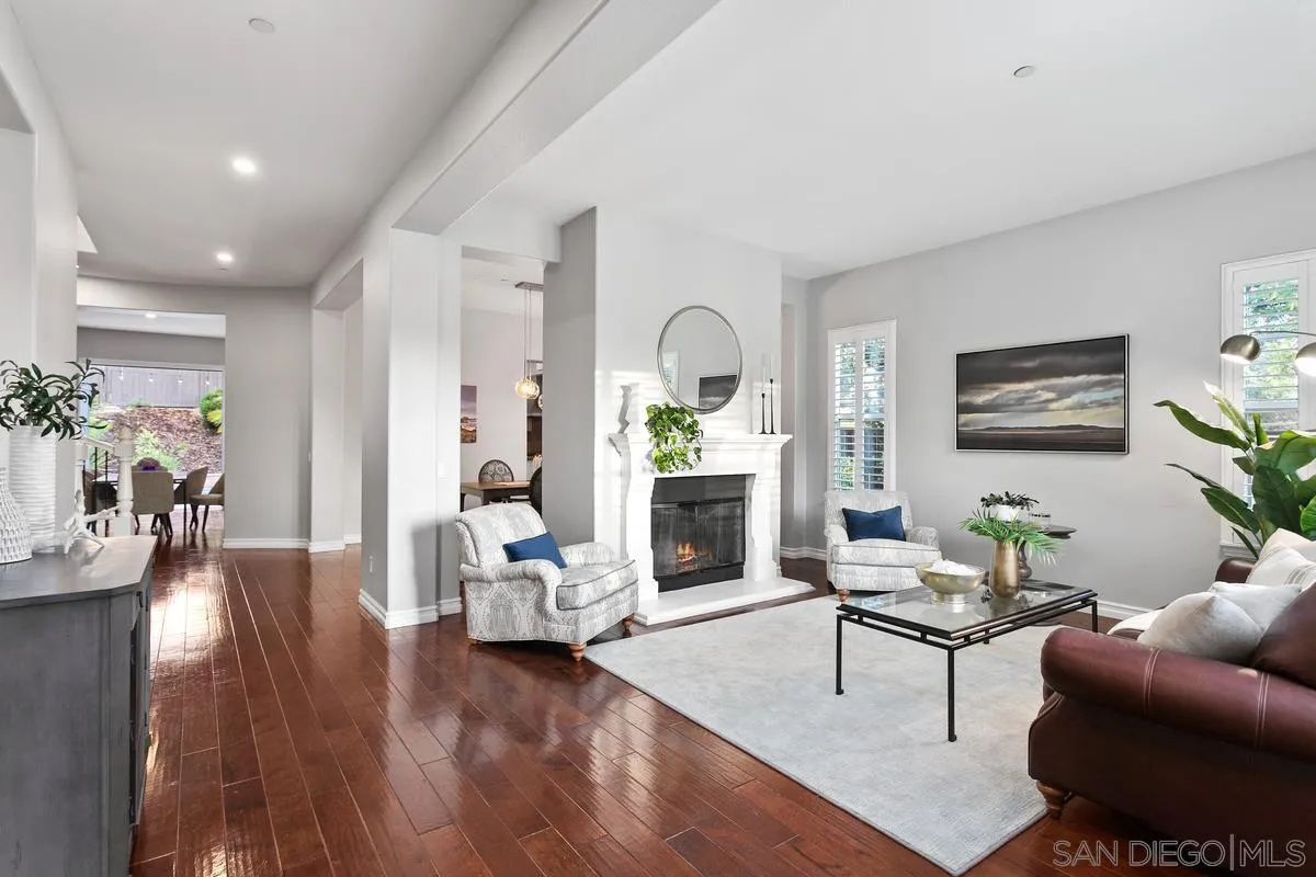 16309 Deer Ridge Road San Diego, CA 92127 - Photo 11 of 37 a living room with furniture and a fireplace