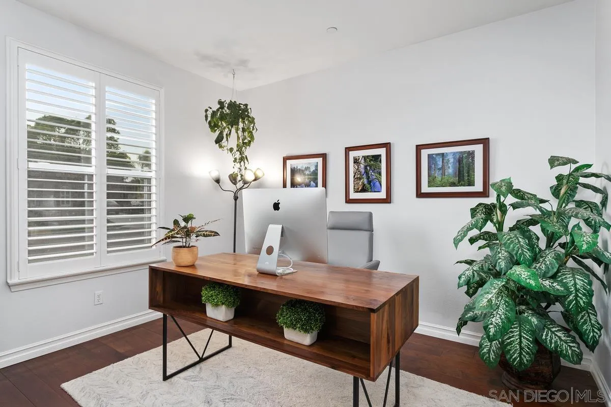 16309 Deer Ridge Road San Diego, CA 92127 - Photo 13 of 37 a view of a workspace with a table and chair in a room