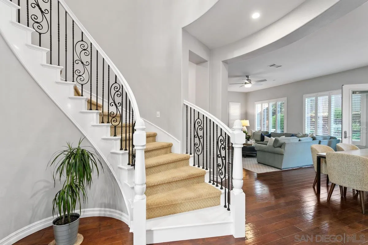 16309 Deer Ridge Road San Diego, CA 92127 - Photo 15 of 37 a view of entryway and dining room with wooden floor