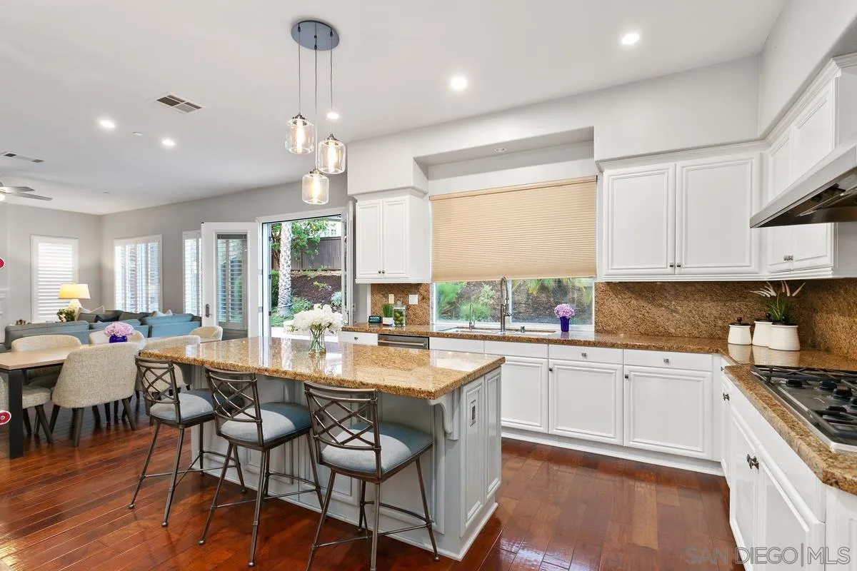 16309 Deer Ridge Road San Diego, CA 92127 - Photo 21 of 37 a large kitchen with lots of counter space and appliances