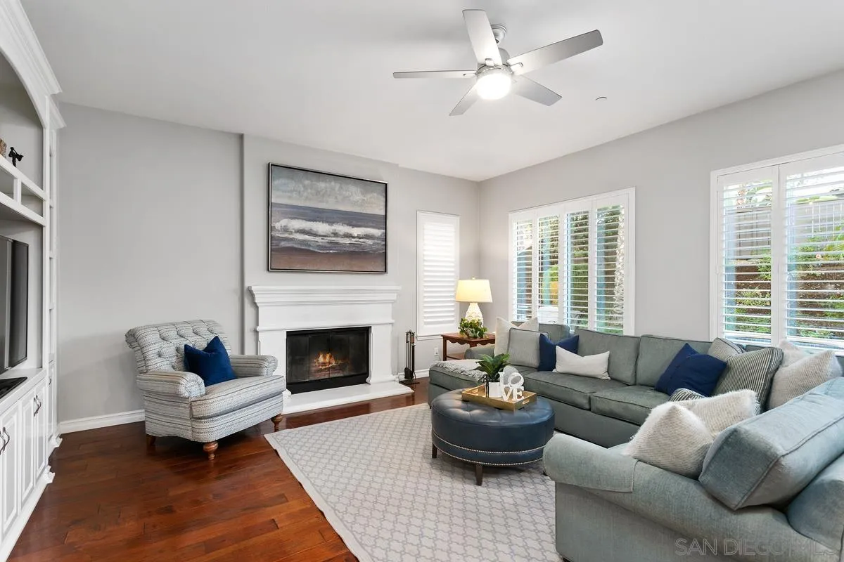 16309 Deer Ridge Road San Diego, CA 92127 - Photo 23 of 37 a living room with furniture and a fireplace