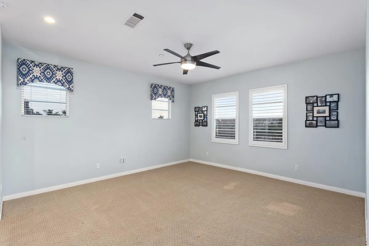 16309 Deer Ridge Road San Diego, CA 92127 - Photo 25 of 37 a view of an empty room with a window