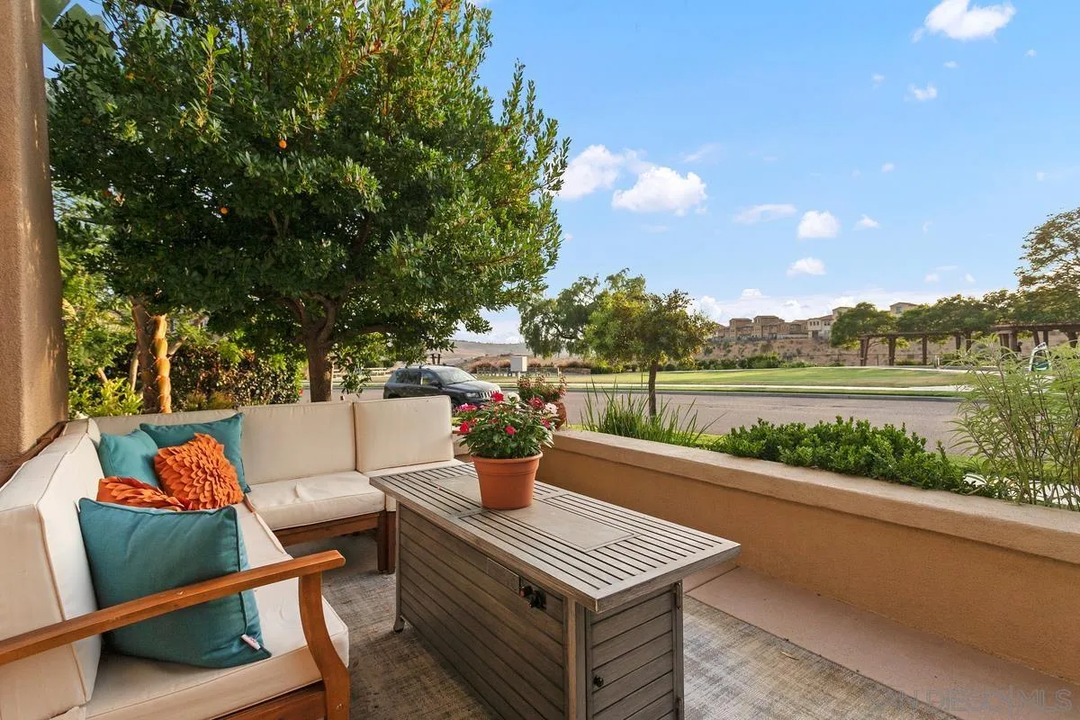 16309 Deer Ridge Road San Diego, CA 92127 - Photo 3 of 37 a view of a roof deck with furniture and a lake view