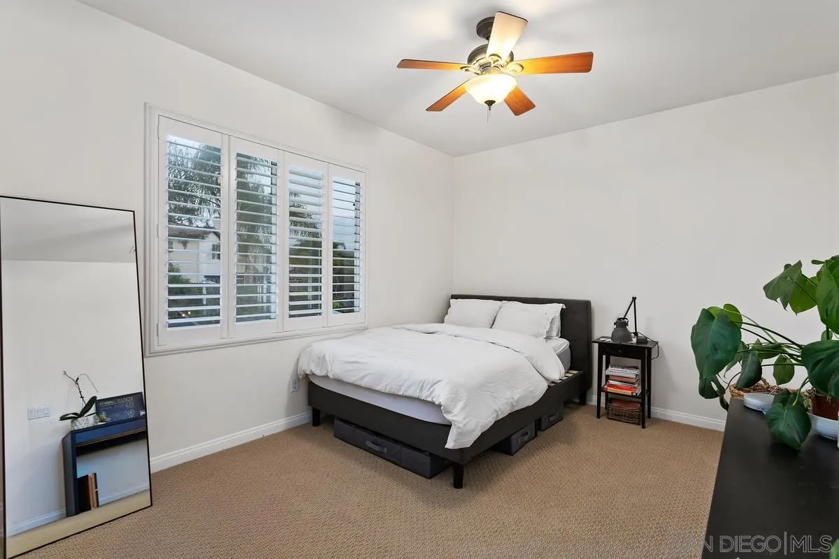 16309 Deer Ridge Road San Diego, CA 92127 - Photo 32 of 37 a bed sitting in a bedroom next to a window