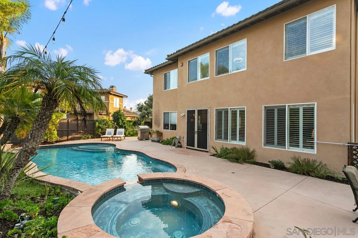 16309 Deer Ridge Road San Diego, CA 92127 - Photo 10 of 37 a swimming pool with outdoor seating and yard