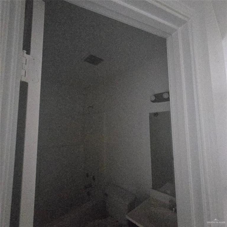 3915 South Alamo Road, Unit 20 Edinburg, TX 78542 - Photo 13 of 14 a close up of a shower