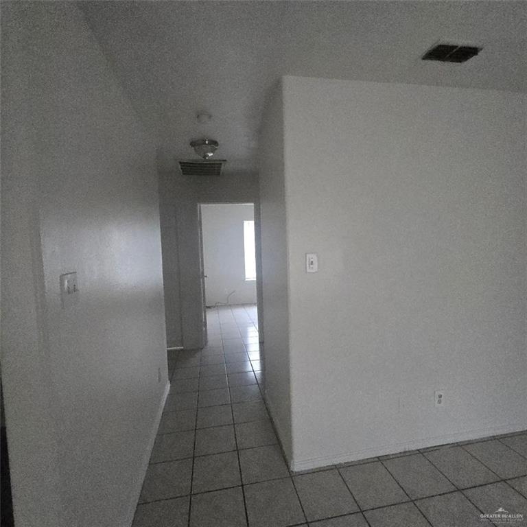 3915 South Alamo Road, Unit 20 Edinburg, TX 78542 - Photo 7 of 14 a view of a hallway