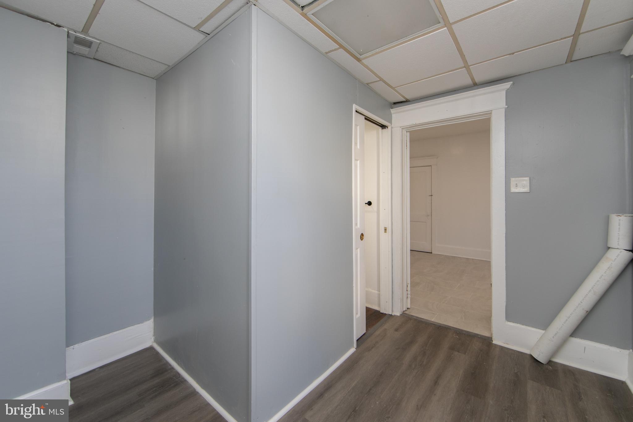 513 Benson Street Camden, NJ 08103 - Photo 14 of 37 a view of hallway with wooden floor