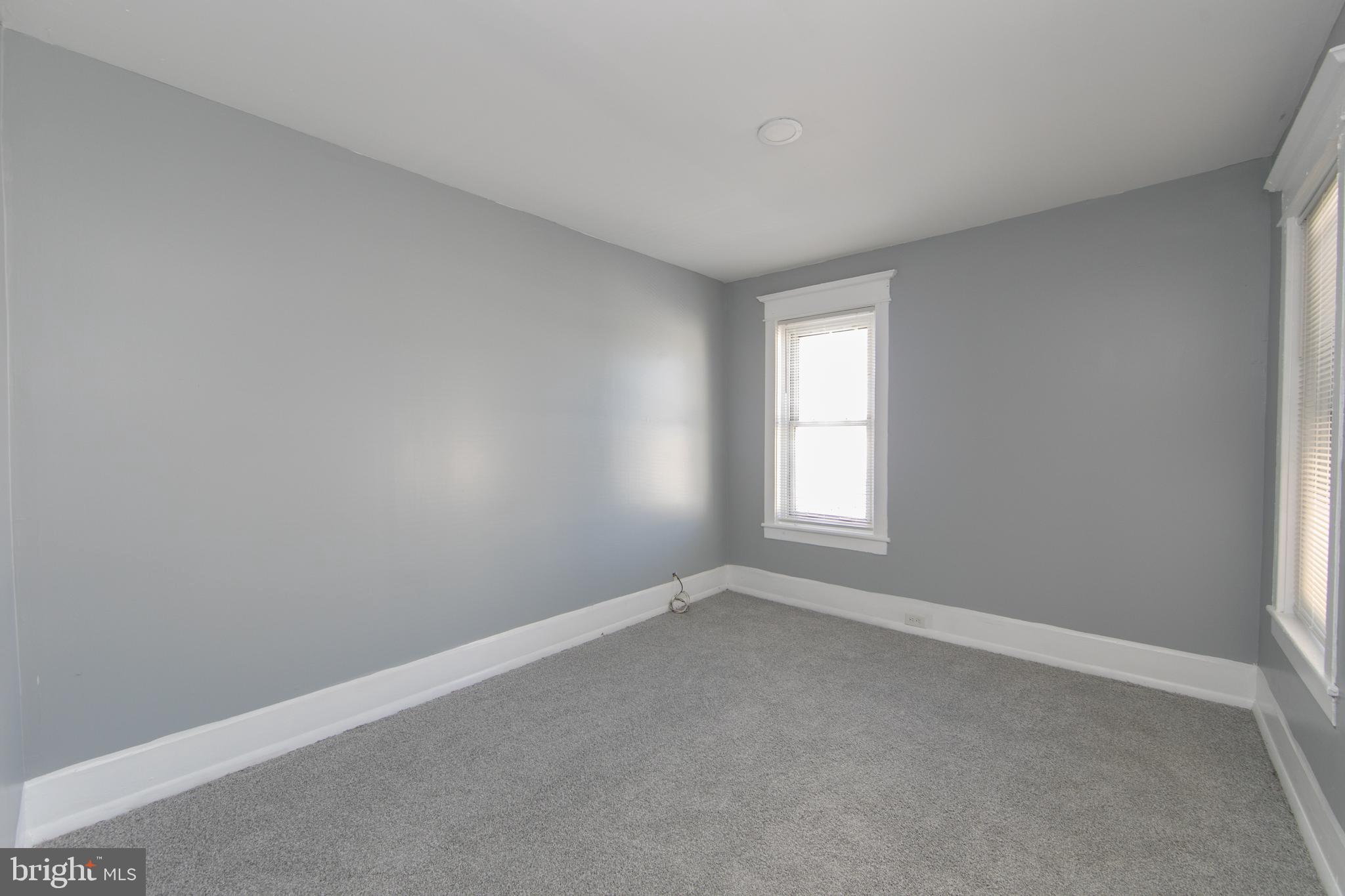 513 Benson Street Camden, NJ 08103 - Photo 23 of 37 an empty room with a window