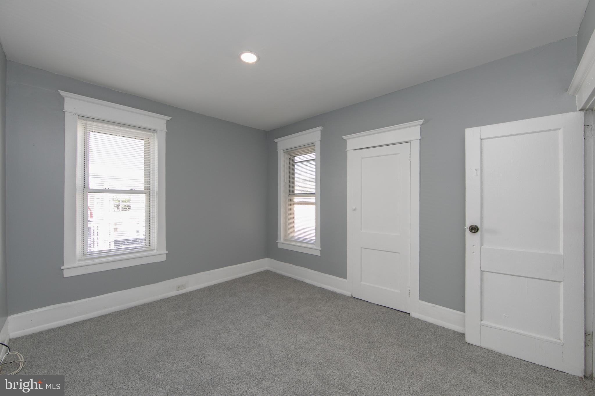 513 Benson Street Camden, NJ 08103 - Photo 24 of 37 an empty room with windows