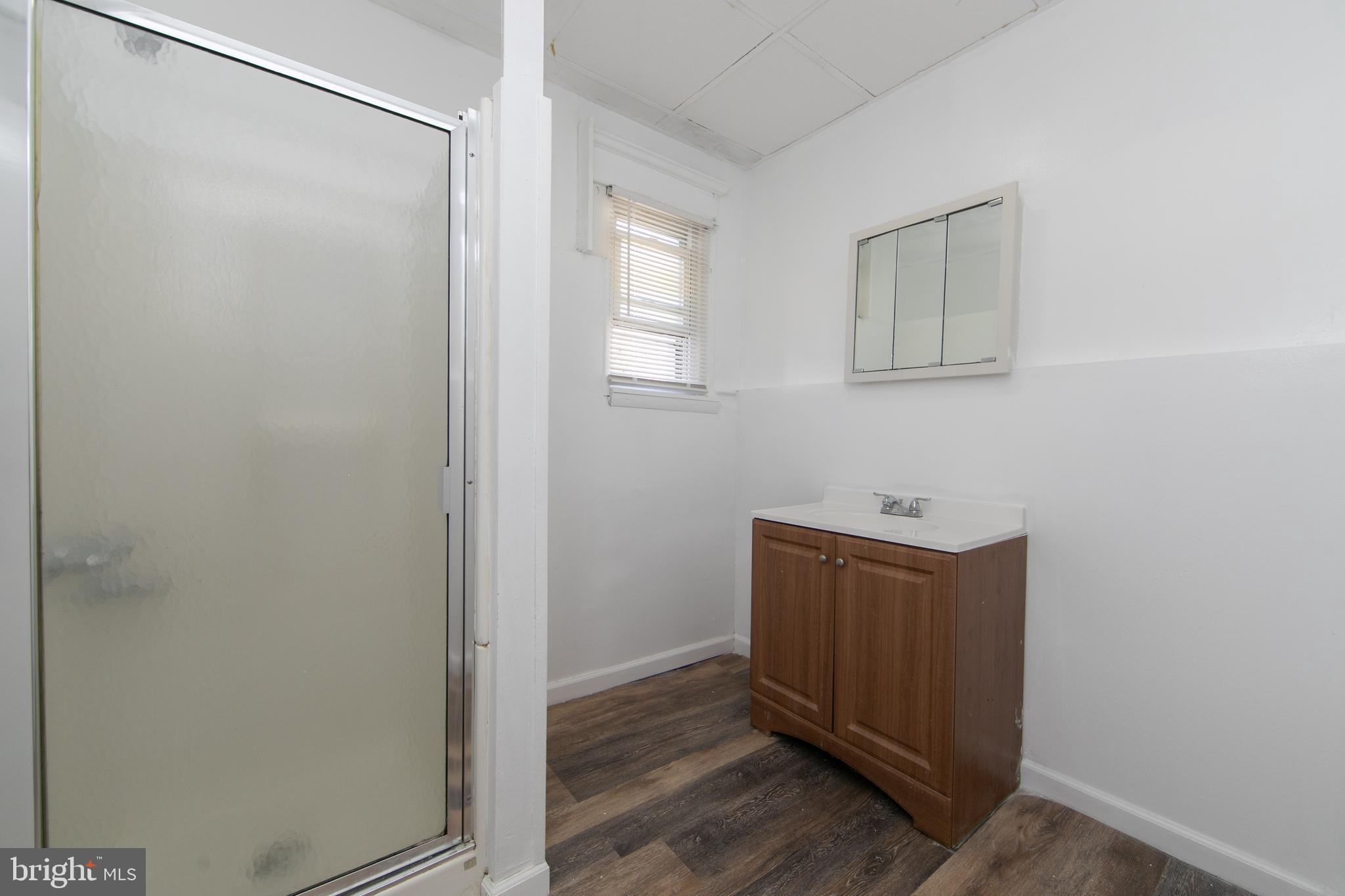 513 Benson Street Camden, NJ 08103 - Photo 28 of 37 a view of an empty room with wooden floor and closet