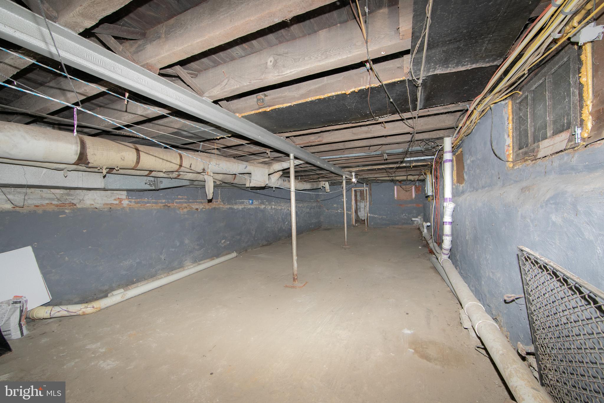 513 Benson Street Camden, NJ 08103 - Photo 34 of 37 a view of an empty room with wooden roof