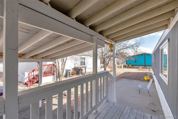 a view of a porch and garden