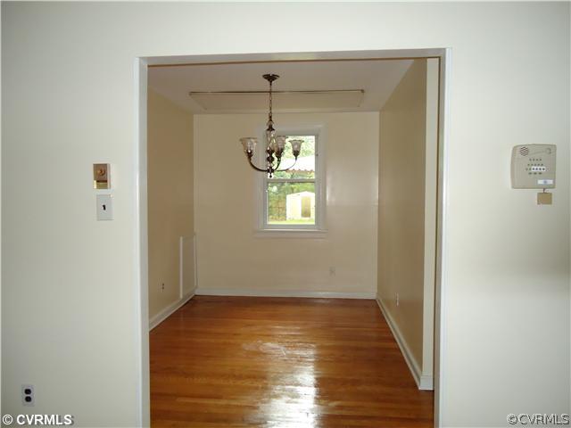 1607 Foster Road Richmond, VA 23226 - Photo 15 of 22 Dining Room - Hardwood Floor, new chandelier.