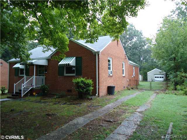 Exterior Front - Side view with garage in the back