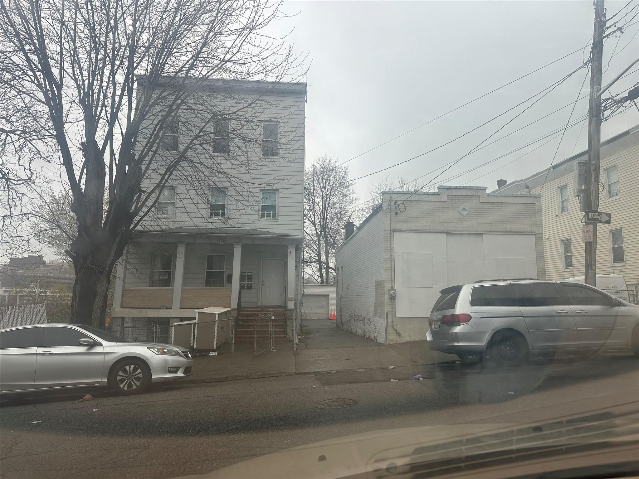 17 Chestnut Street Yonkers, NY 10701 - Photo 16 of 20 a view of a car parked in front of a house