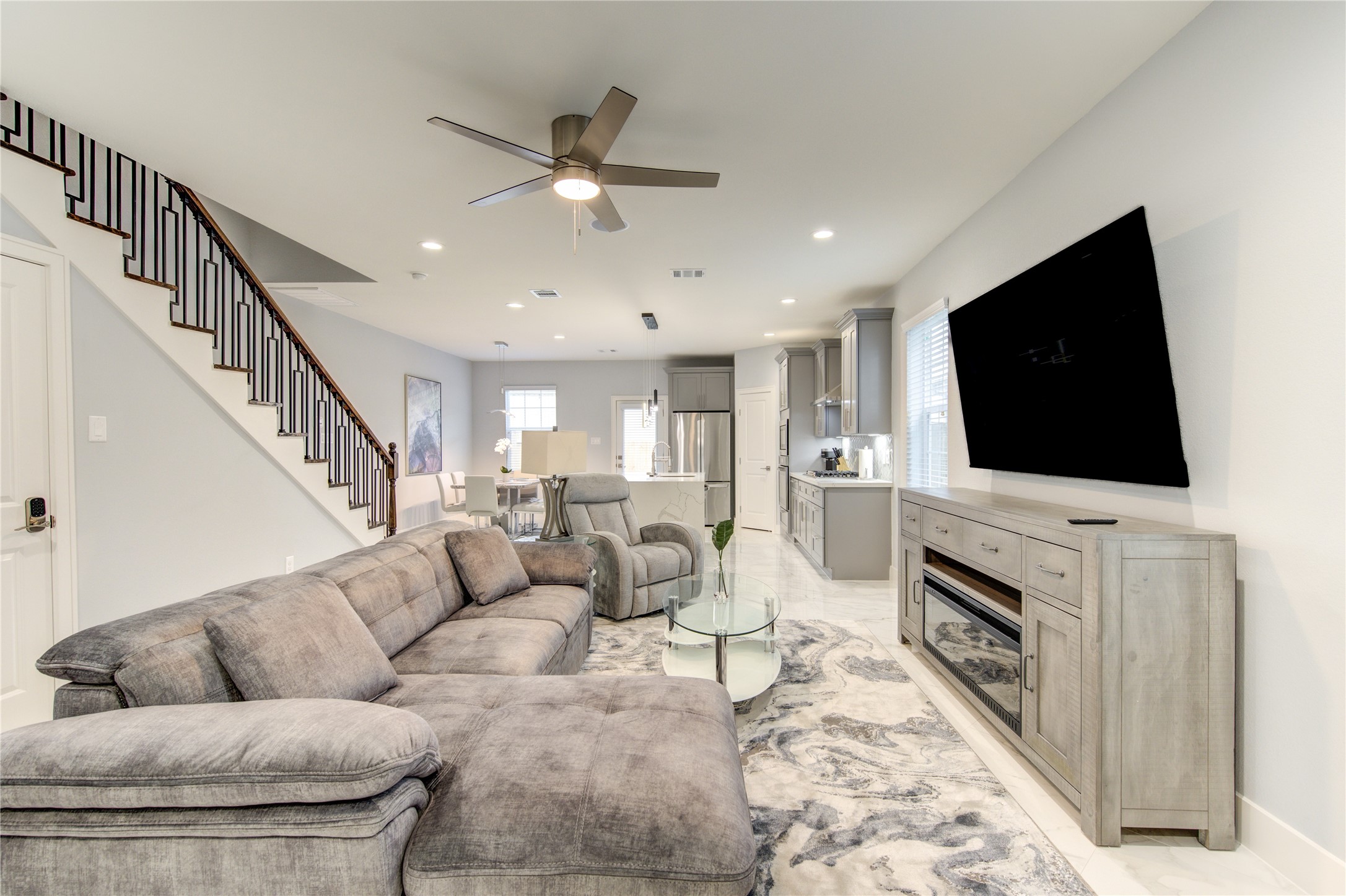 10021 Alfred Lane, Unit B Houston, TX 77041 - Photo 14 of 46 a living room with furniture and a flat screen tv