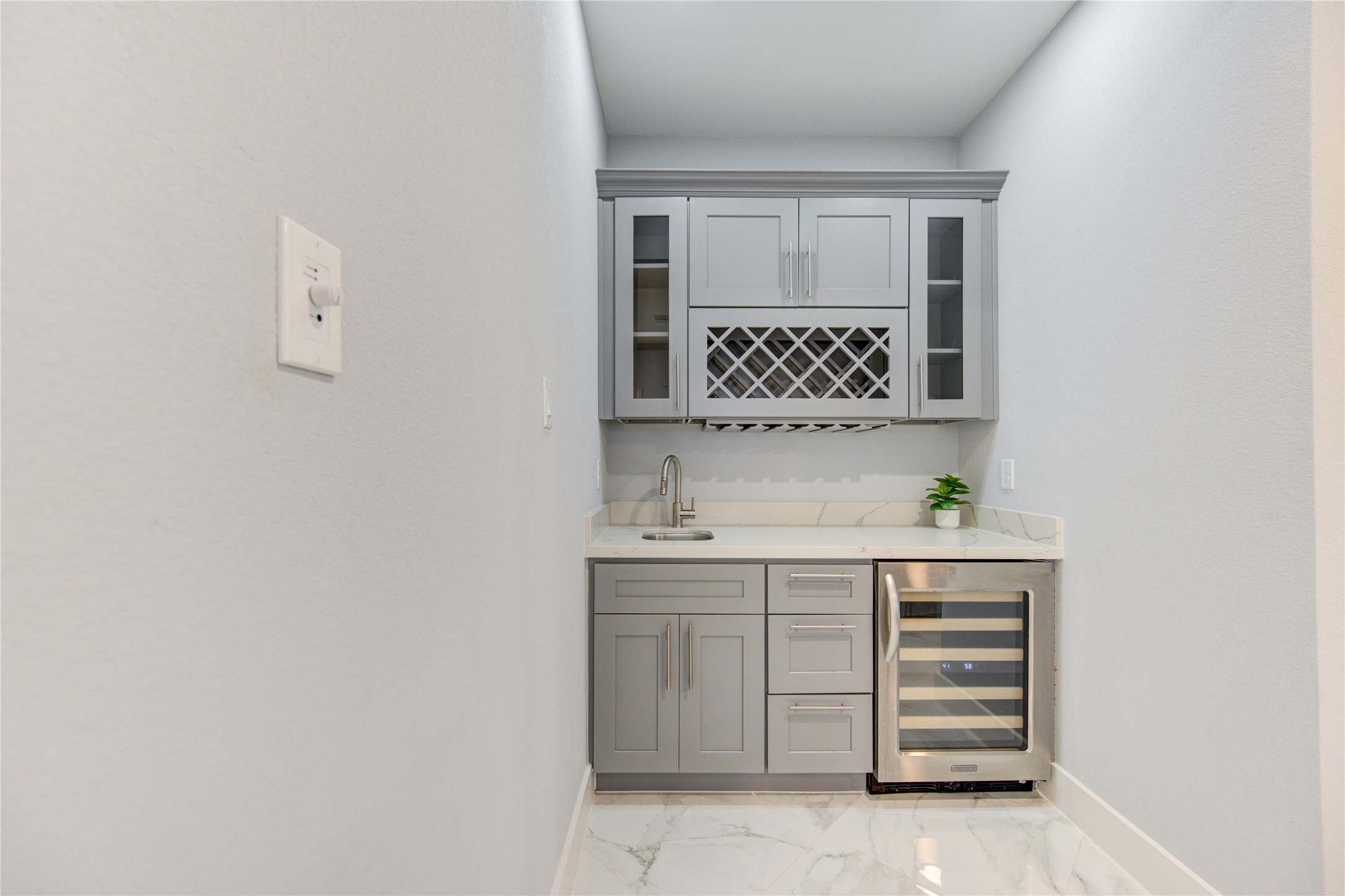 10021 Alfred Lane, Unit B Houston, TX 77041 - Photo 18 of 46 a view of cabinets and wooden floor