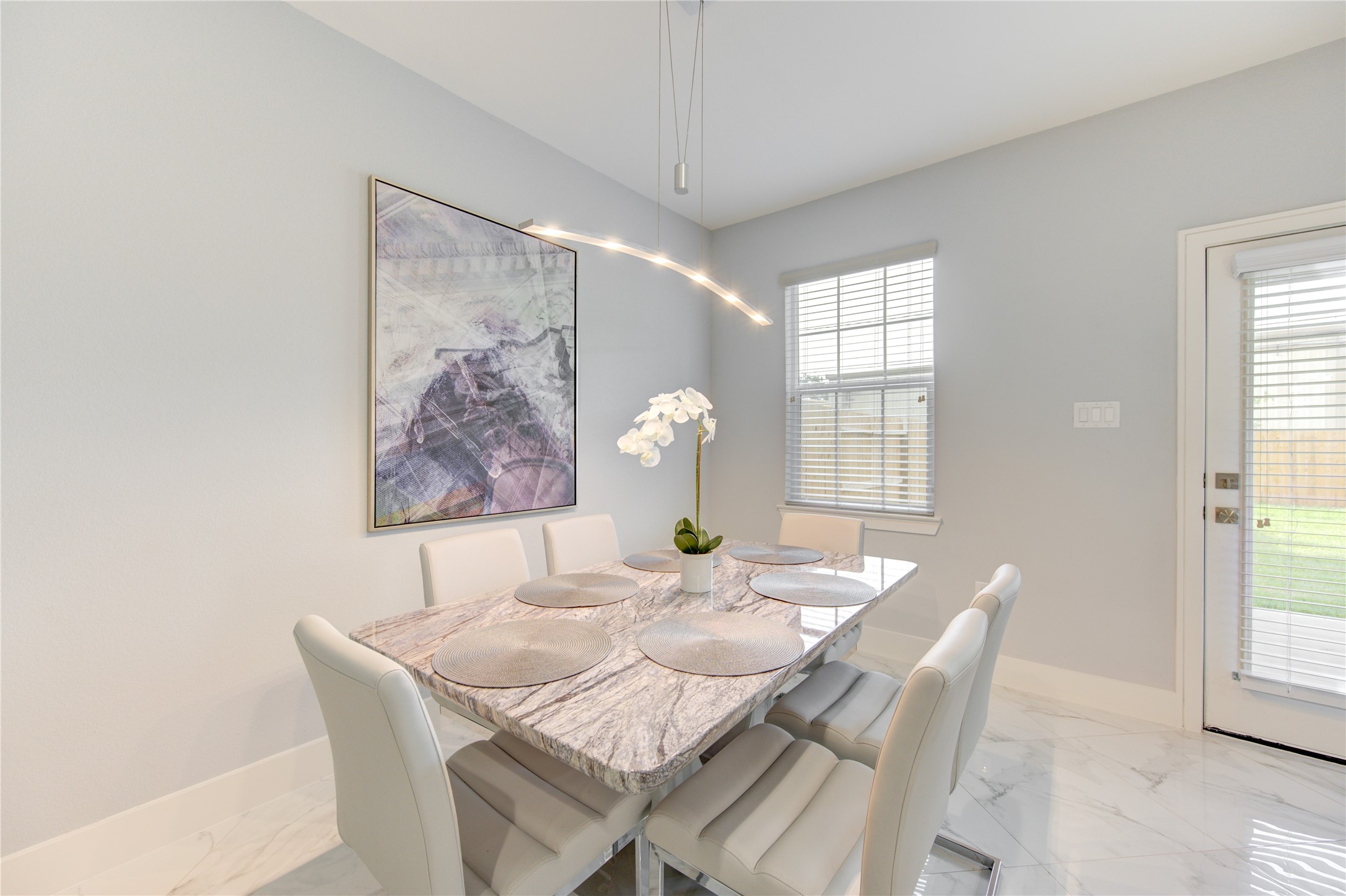 10021 Alfred Lane, Unit B Houston, TX 77041 - Photo 20 of 46 a view of a dining room with furniture and window