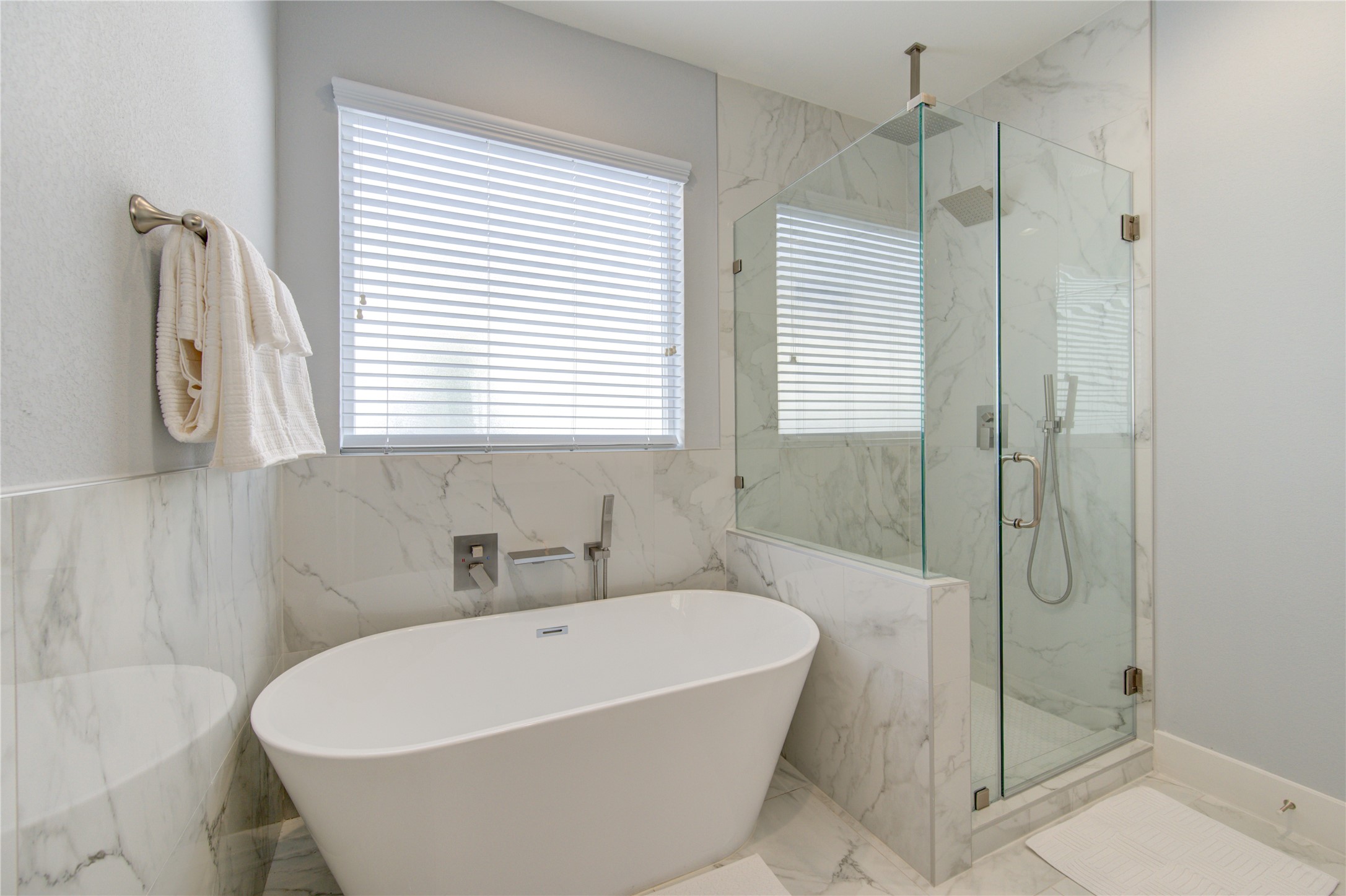 10021 Alfred Lane, Unit B Houston, TX 77041 - Photo 24 of 46 a white bath tub sitting next to a shower