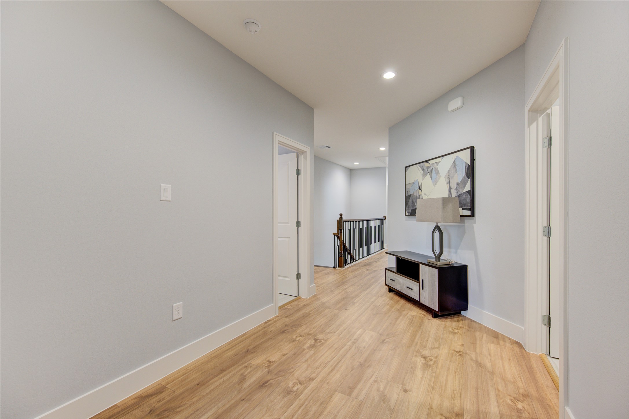 10021 Alfred Lane, Unit B Houston, TX 77041 - Photo 32 of 46 a view of empty room with wooden floor