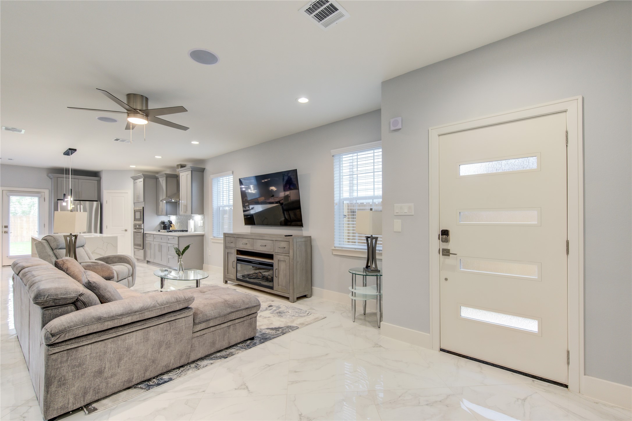 10021 Alfred Lane, Unit B Houston, TX 77041 - Photo 4 of 46 a living room with furniture and a flat screen tv