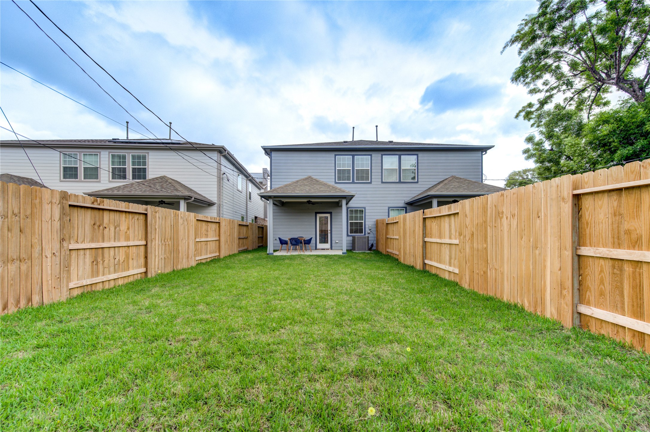 10021 Alfred Lane, Unit B Houston, TX 77041 - Photo 44 of 46 a view of a house with a yard