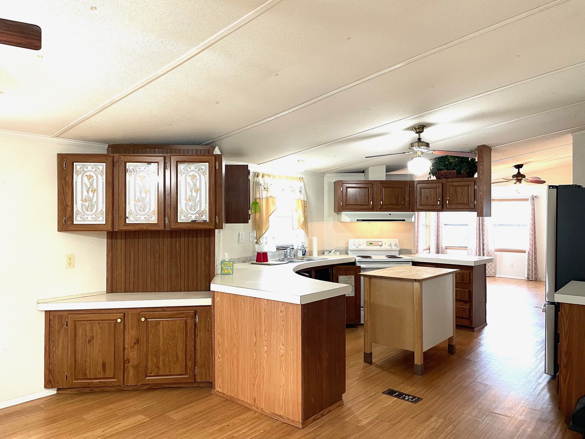 800 Archie Lane Belton, TX 76513 - Photo 15 of 32 The KITCHEN is roomy enough with countertops and cabinet storage.
