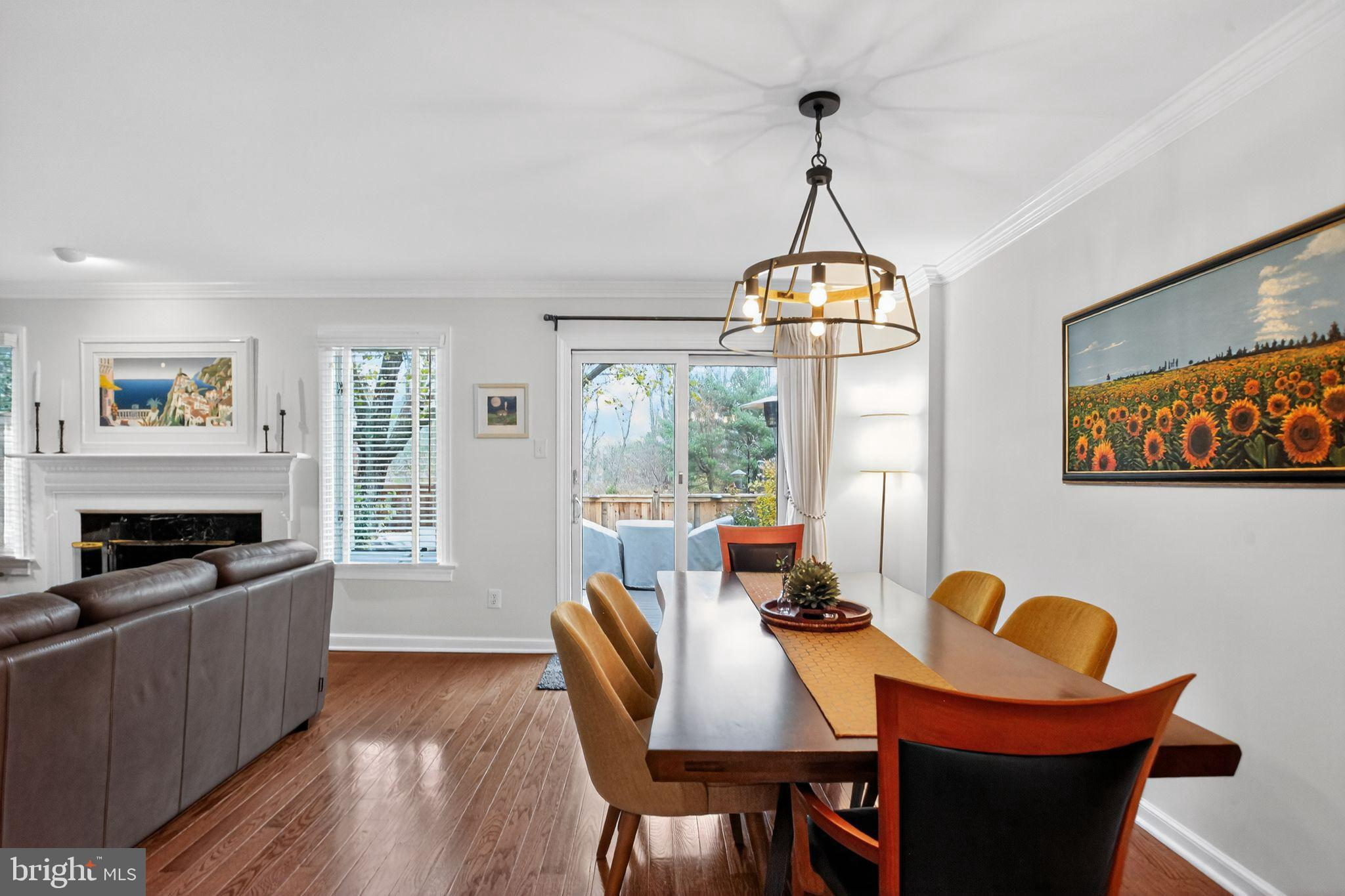 149 Splitrail Lane Blue Bell, PA 19422 - Photo 14 of 40 a dining room with furniture a chandelier and wooden floor