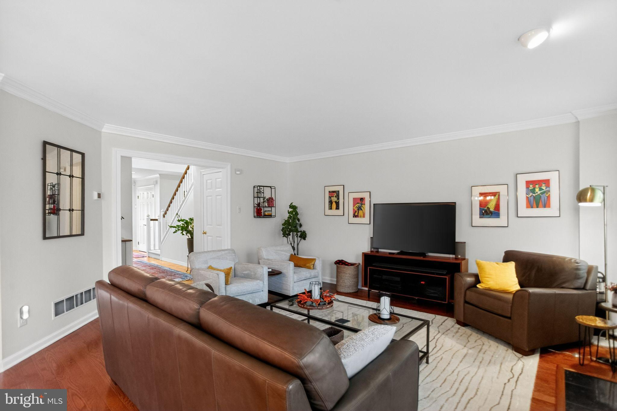 149 Splitrail Lane Blue Bell, PA 19422 - Photo 17 of 40 a living room with furniture and a flat screen tv