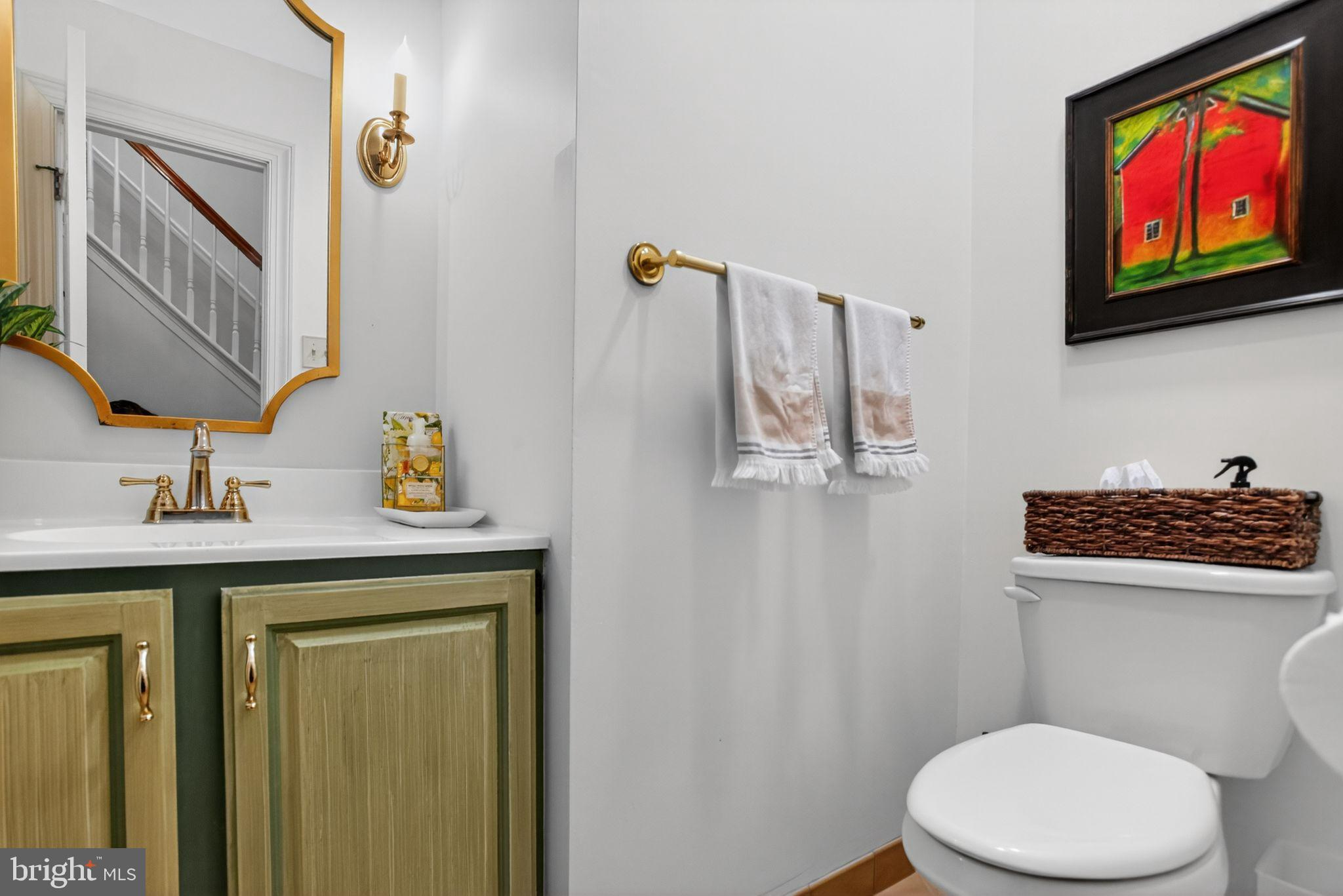 149 Splitrail Lane Blue Bell, PA 19422 - Photo 22 of 40 a bathroom with a toilet a sink and a mirror