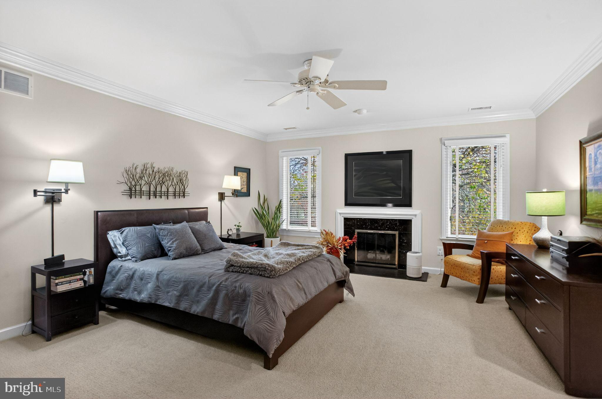 149 Splitrail Lane Blue Bell, PA 19422 - Photo 23 of 40 a bedroom with a bed and a fireplace