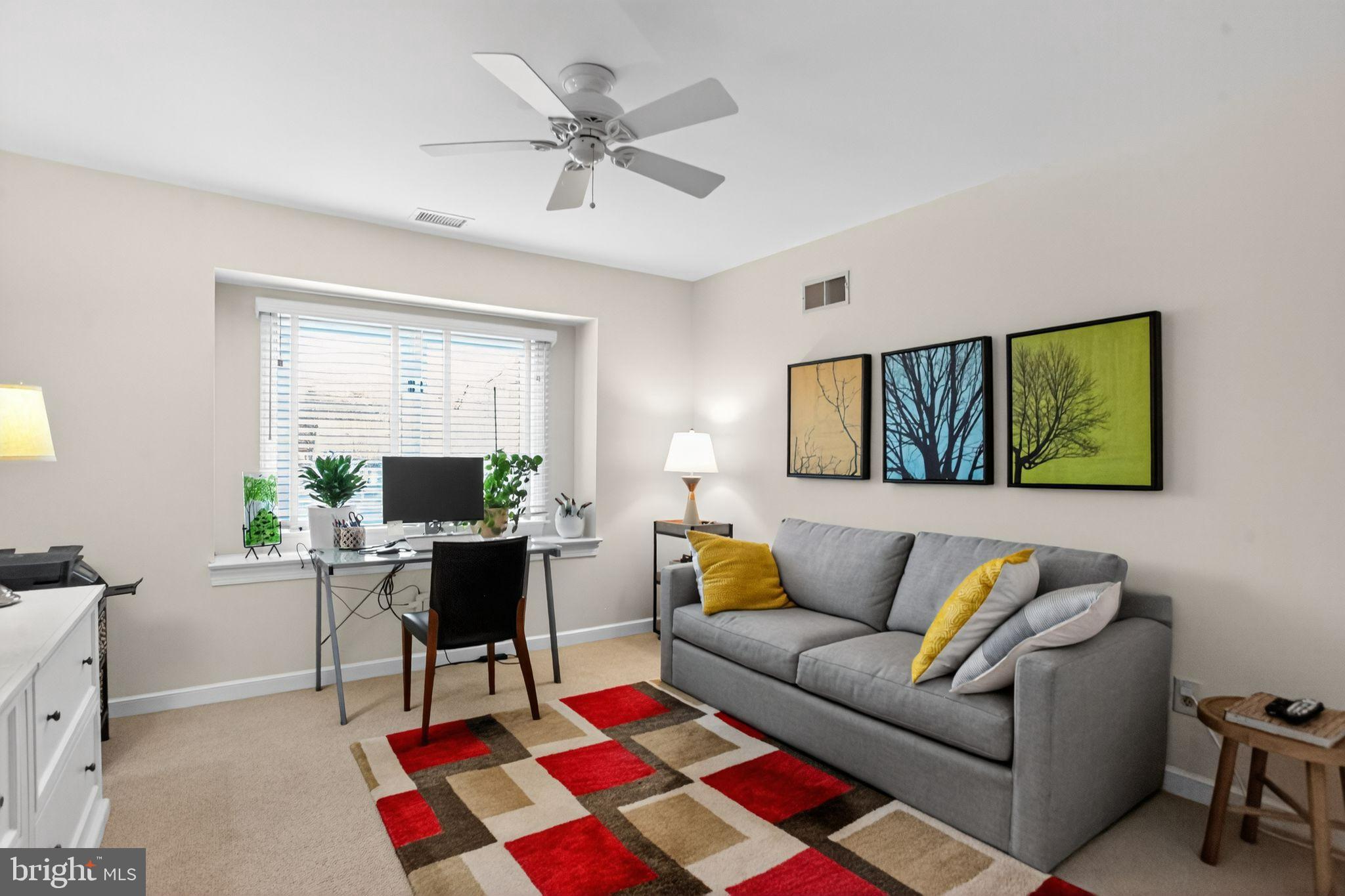 149 Splitrail Lane Blue Bell, PA 19422 - Photo 30 of 40 a living room with furniture and a potted plant