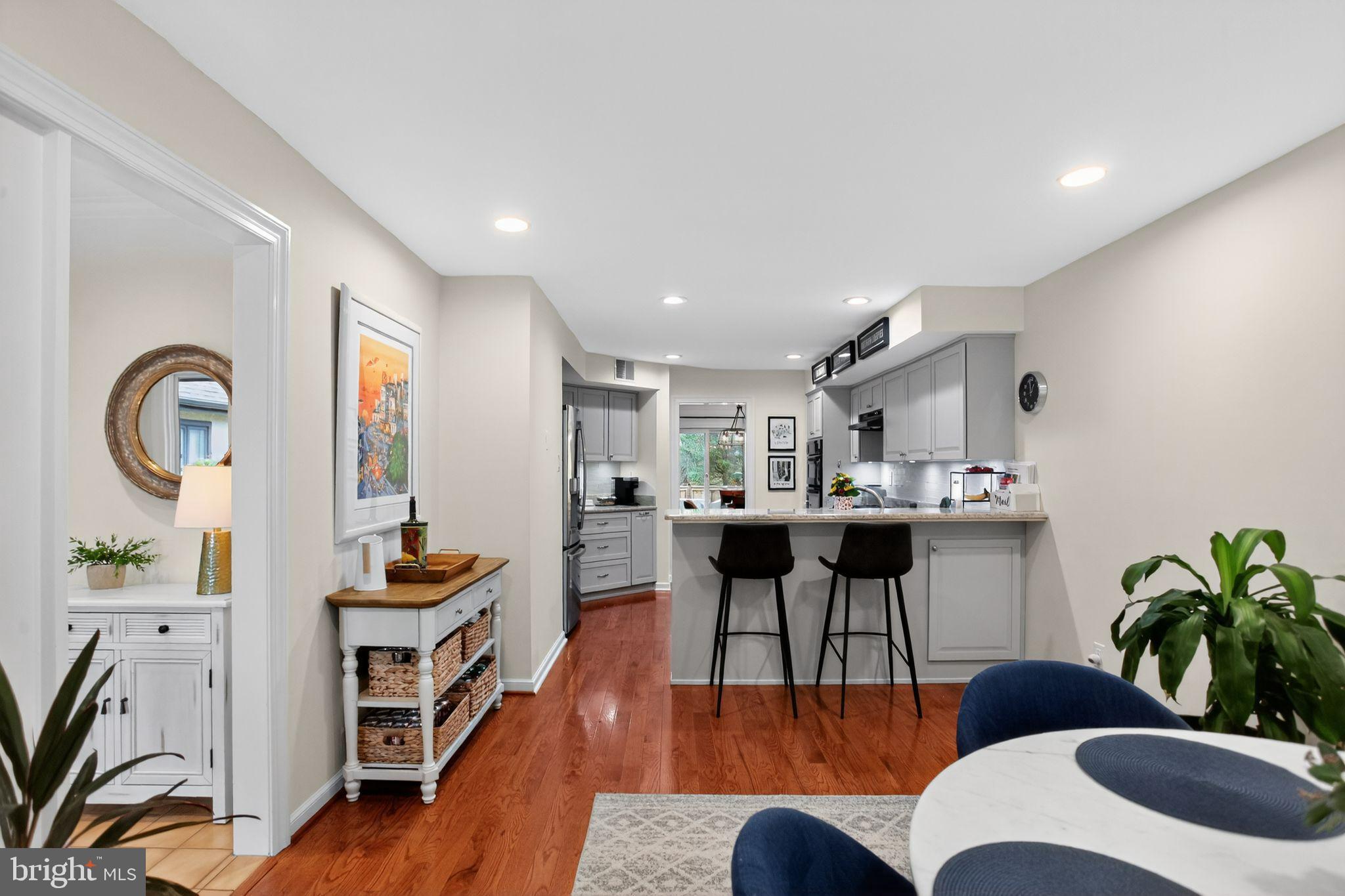 149 Splitrail Lane Blue Bell, PA 19422 - Photo 8 of 40 a living room with furniture a rug and a potted plant