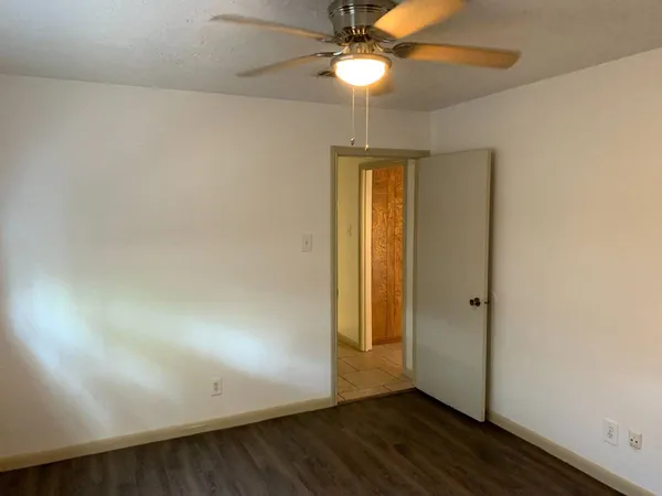 a bathroom with a sink toilet and vanity