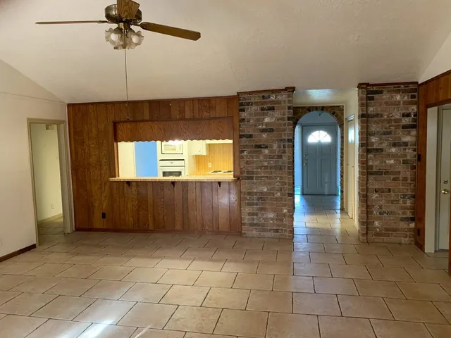 a view of empty room with windows