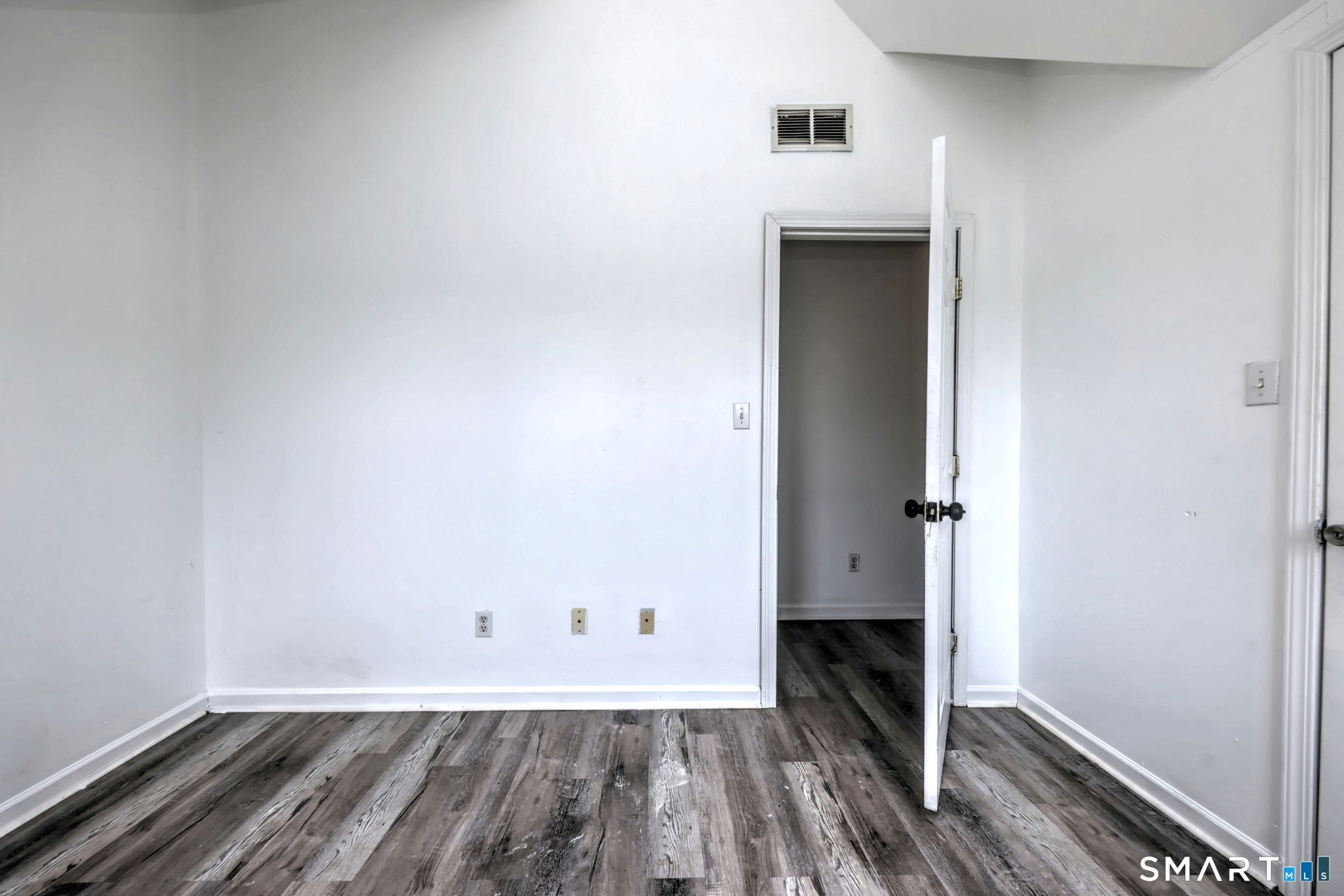 483 Ferry Street, Unit 3 New Haven, CT 06513 - Photo 16 of 28 a view of empty room with wooden floor